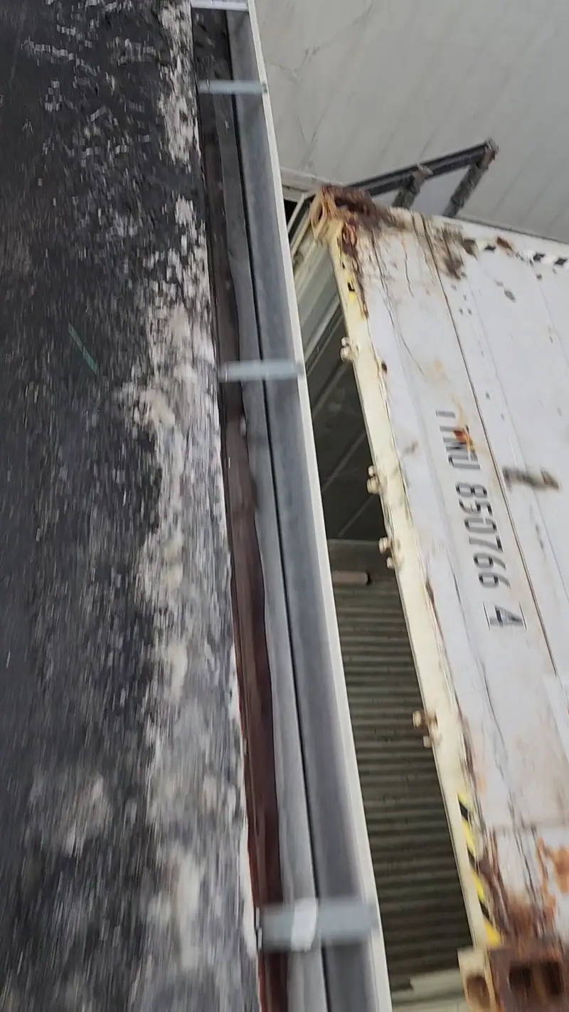 An old, rusted sectional gutter before repair or replacement