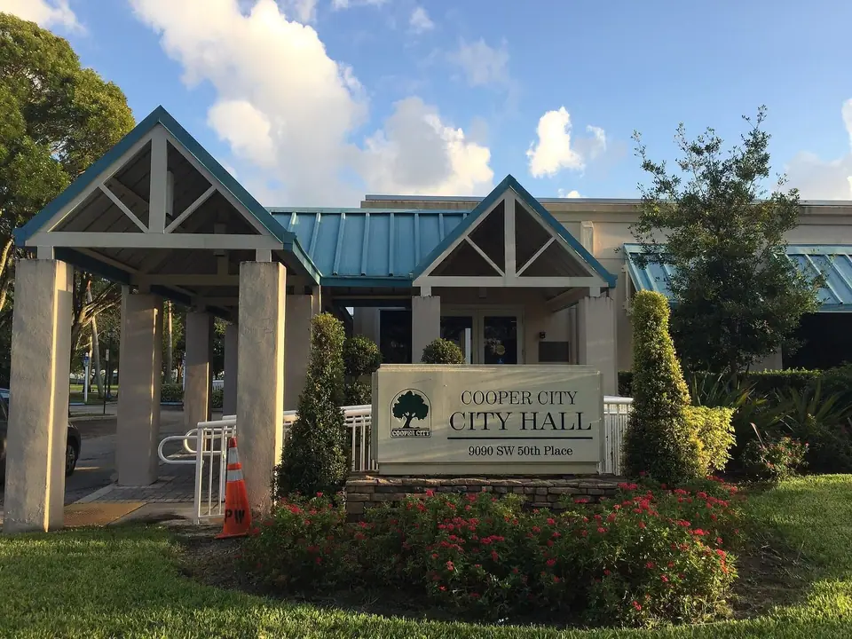 Cooper City City Hall entrance and sign in Cooper City, FL